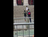 Girl white sleeves sit  stairs pigeon railings