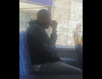 Guy pushes eyes out of sockets with fingers on the bus
