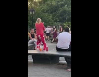 Red pants older guy moves erratically bench 