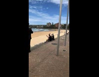 Man black shirt selfie seagull on head