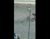 Woman flip tumble surfboard beach sand cheer Part 2