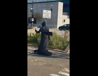 Man dresses up as the grim reaper 