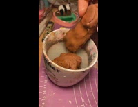 Brown clay shaped into lips 