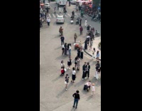 People in different photoshoot around the roundabout