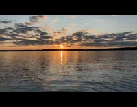 Timelapse beautiful lake sunset moving clouds clear