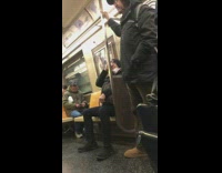 Collab Subway Creatures - two older men on orange subway arguing