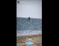 Man walks on water at the beach, Jesus Walks by Kanye West plays in background