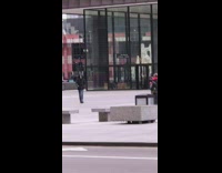 Black gas mask catwalk jacket closed buildings