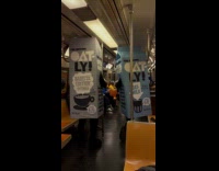 Two Oatly mascot stands during train ride