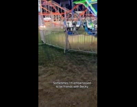 Woman slips climbing down from ride