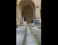 Old man lion statue pose bunny ears