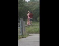 Woman beige dress photo shoot park music