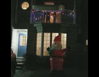 Mattress bed pushed over balcony onto Santa