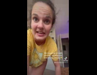 Girl yellow shirt grabs white towel dress runs to bathroom 