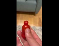 Woman shows tomato looked like a snowman