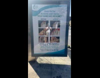 Woman reacts at nasty toes ad display