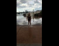 girl tries to do two flips in wet cement and falls the second time