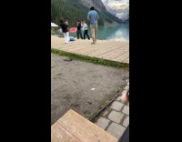 Collab IITW - Man and woman black white jacket tiktok dance at lake