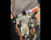 Guy has big snake around neck on subway