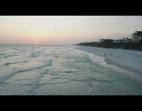 Drone footage of beach coastline shore