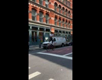 Collab winy - Two guys stand on bike seat and handle