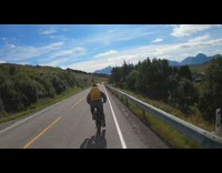Time Lapse video of a man on a bicycle ride downhill