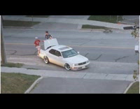 Two guys jump bounce on car truck