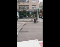 Shirtless guy grey sweatpants guy sits chair 