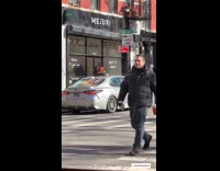Woman pull construction cone cart with toddler