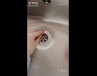 Lady cleans house toilet sink shower rug 