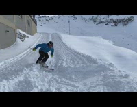 Blue jacket guy backflip ski deep snow 