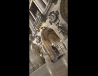 Man lie down to get perfect angle of the woman