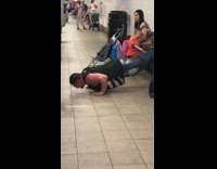 a man doing push ups with feet on a bench