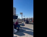 Man singing funky town with low energy