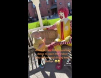 Kid lip syncs to ronald mcdonald statue 