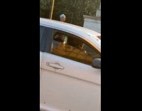 Man does meditation stance with things attached to fingers 