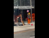 Man wears pikachu mask cheering marathon runners