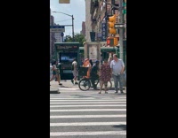 Collab winy - Man in hotdog costume on the sidewalk