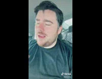 Guy talks to UK person on phone