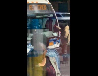 Homeless man block throw coins spit at bus