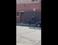 Guy skull mask sequin pants dance on street