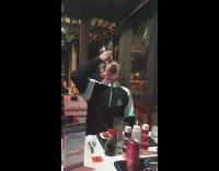 Black white jacket guy swallows wasabi restaurant 