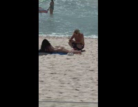 Woman bikini lay front beach shake butt