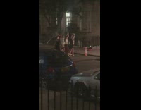 Group women dance tiktok sidewalk cone nighttime