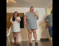 Woman with no pants  farts blue powder gender reveal party 