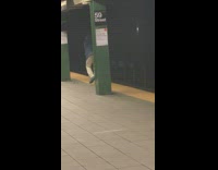 man large pole in subway tracks