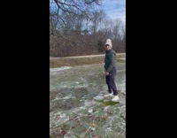Guy throw and shatter block of ice