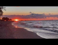 Red sunset beach waves clouds shore