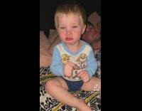 Toddler crying does tiktok pucker face trend dance