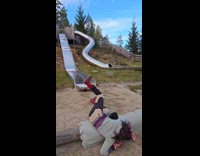 Woman sliding down falls on ground 